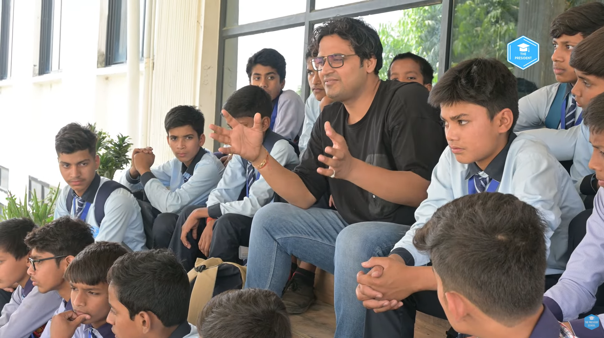 Common area with seating and television